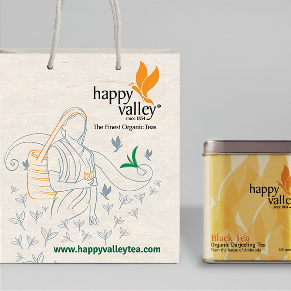 https://www.old.wysiwyg.co.in/sites/default/files/worksThumb/Ambootia-happy-valley-garden-packaging-paper-bag-2017.jpg